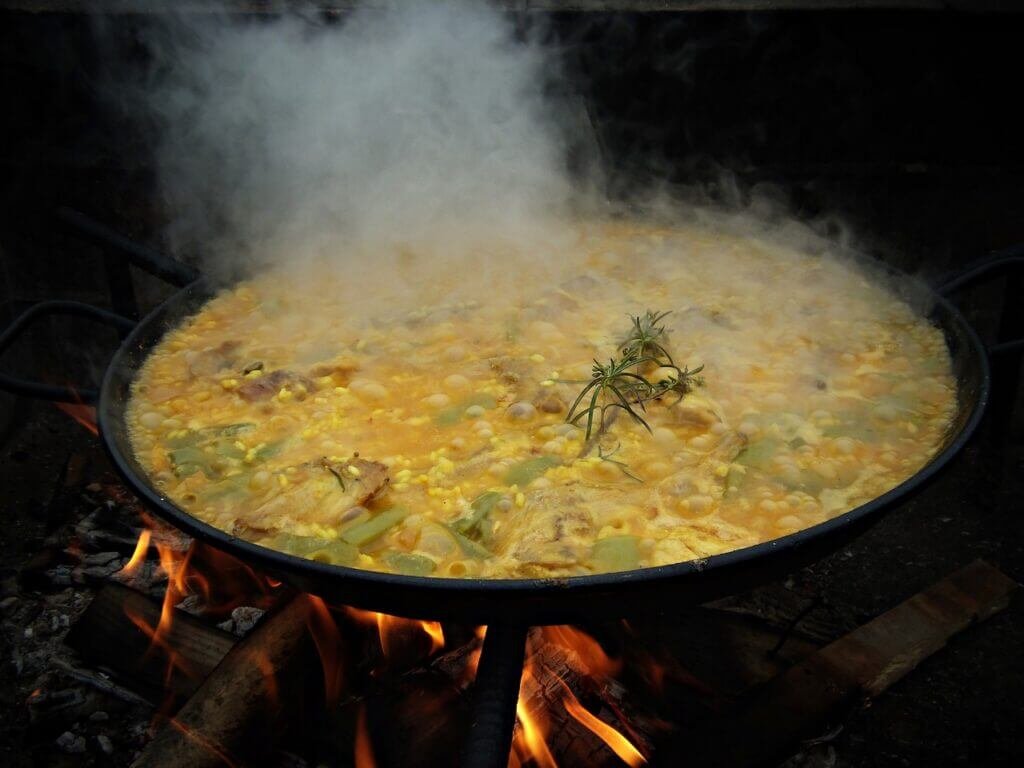 Paella being made over a woodfire