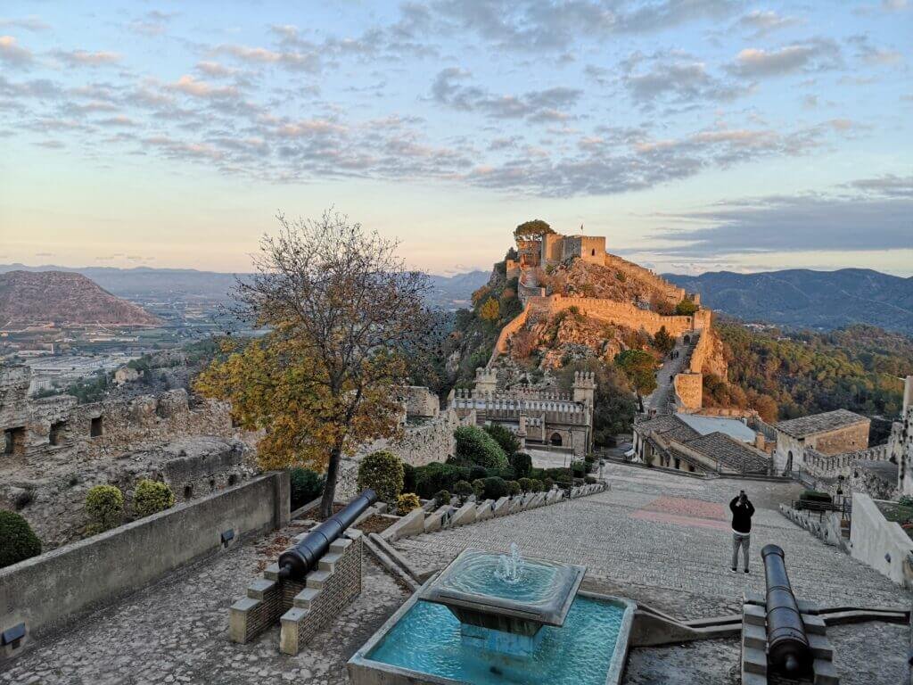 A photo of the Xàtiva Castle with a sunset - a great place to enjoy from Valencia in December
