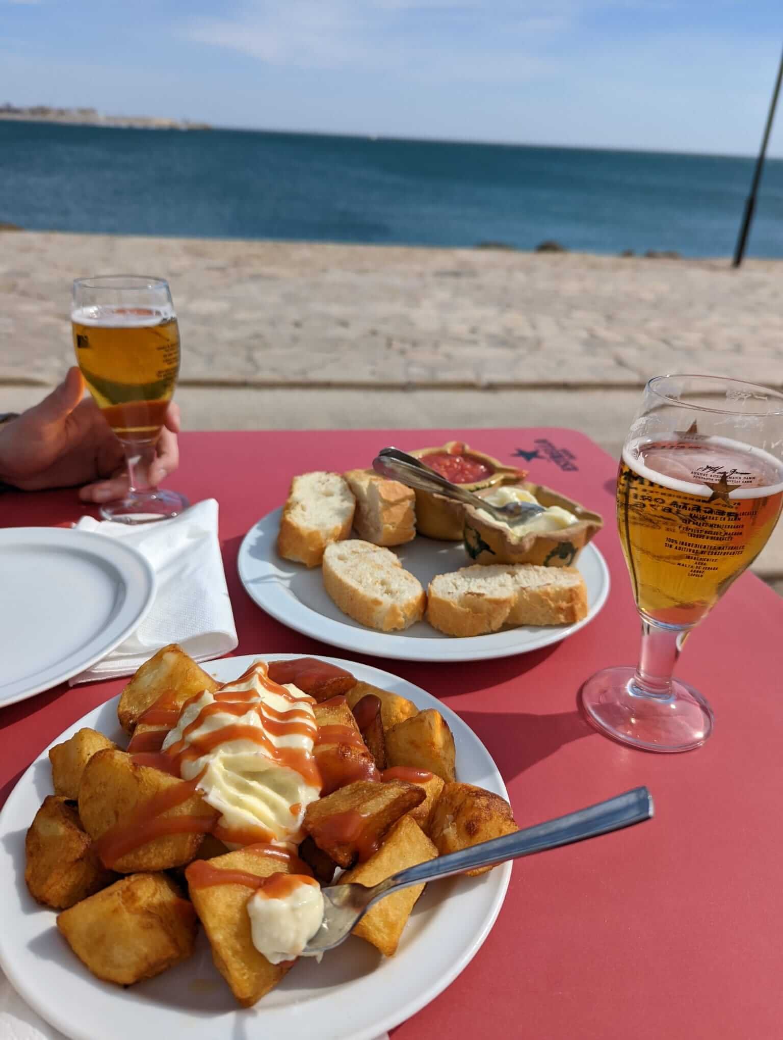 "Braves" with "pa i allioli" in front of the beach, some of the best vegetarian food in Valencia